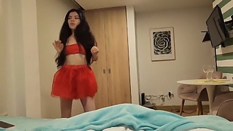 A Stunning Woman In A Red Skirt And Without Underwear Desires To Be Gifted With Sex For Christmas