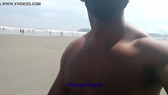 Hundreds Jogging And Walking On The Beach In The Morning